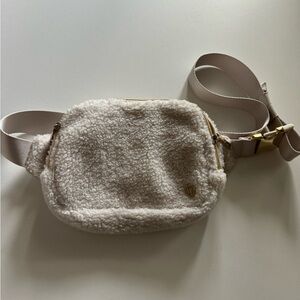 White fleece Lululemon Belt Bag
